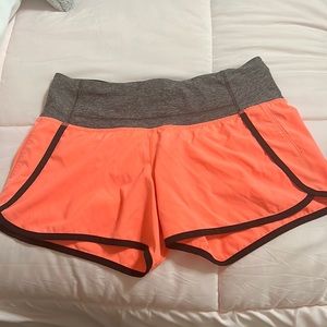 Size 4, Pinky orange lululemon shorts